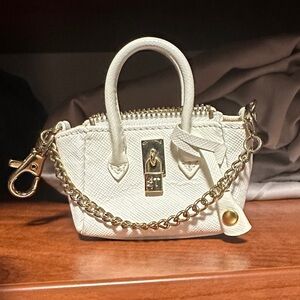 Chic White Bag Charm with Gold Accents